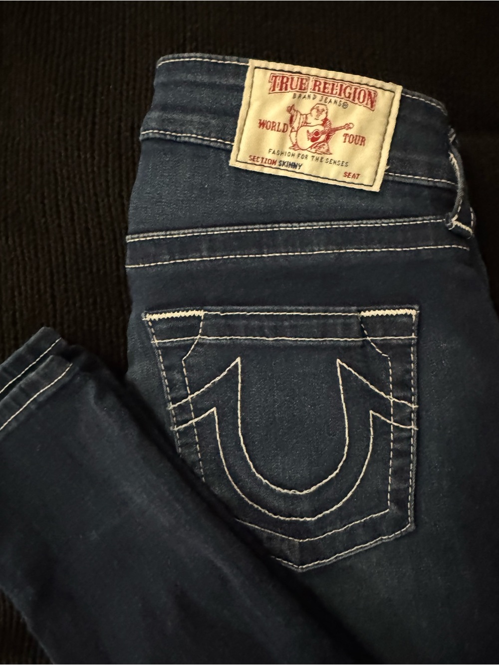 True Religion Dark Blue Skinny Jeans with White Stitching.Size 27. Inseam 27in.
